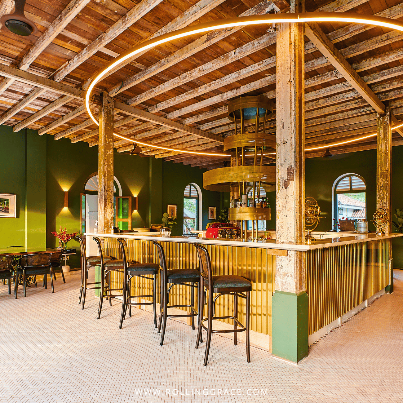 Timber-roofed bar with high stools inside Paloh Restaurant & Bar at Temple Tree Resort Langkawi