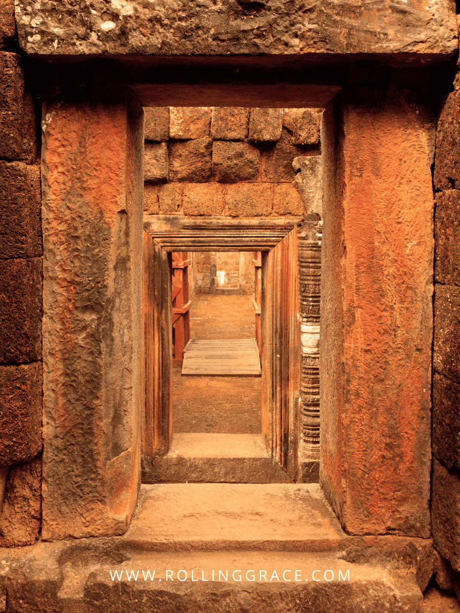11 Best Things to Do in Champasak and Must-see Attractions 4 Hong Nang Sida Temple doorway with carved sandstone walls in the Vat Phou cultural landscape Champasak Laos