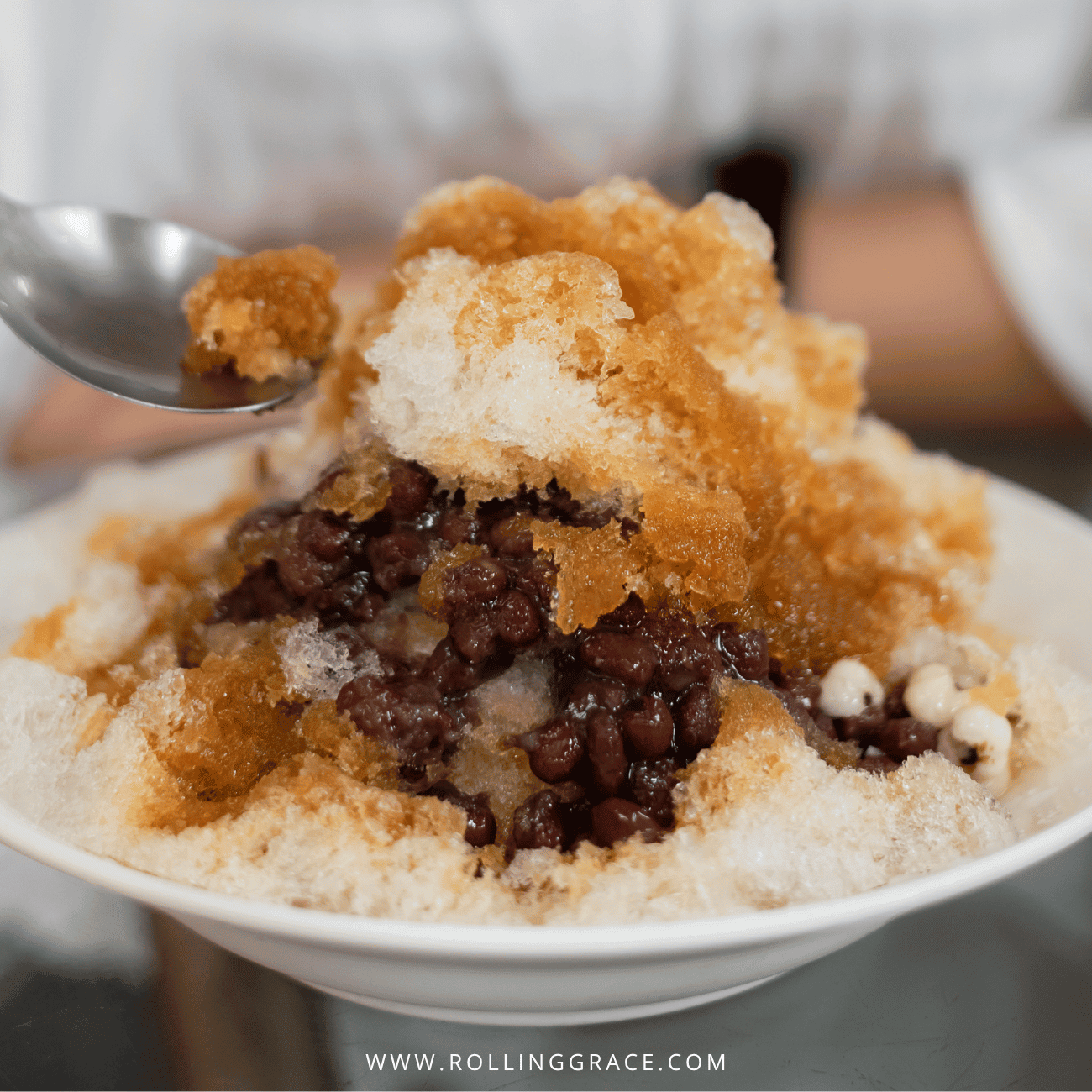 Beitou Food: 9 Best Places to Eat in Beitou, Taipei 9 Chen Family Shaved Ice in Beitou, Taipei, a bowl of shaved ice with brown syrup, red beans and toppings